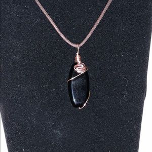 Black stone wrapped pendant